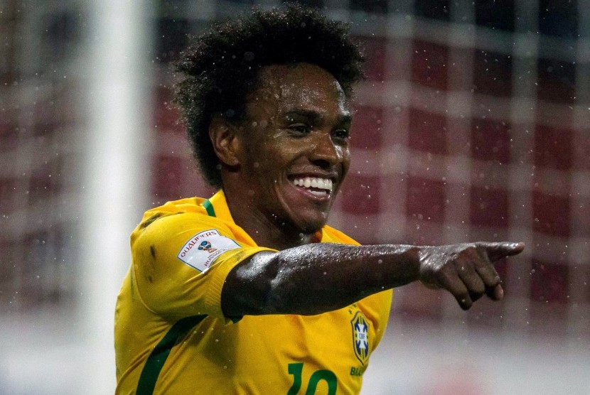 Ekspresi gelandang timnas Brasil, Willian seusai mencetak gol ke gawang Venezuela pada laga kualifkasi Piala Dunia 2018, Rabu (12/10). Laga di stadion Olimpico Metropolitani de Merida itu berakhir kemenangan 2-0 untuk Brasil.