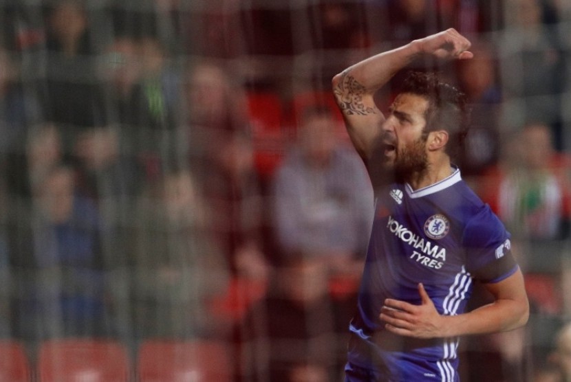 Ekspresi kegembiraan Cesc Fabregas setelah membobol gawang Sunderland.