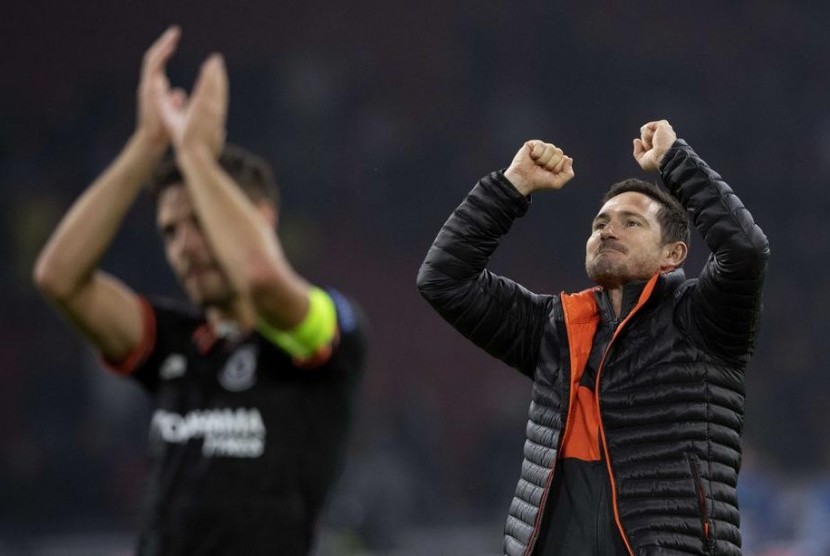 Ekspresi kegembiraan Frank Lampard (kanan)usai kemenangan Chelsea atas Ajax di Liga Champions.