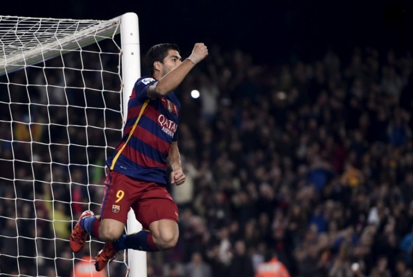 Ekspresi Luis Suarez usai menjebol gawang Real Betis.