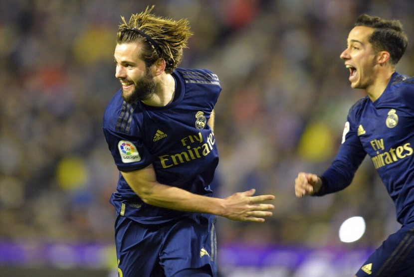 Ekspresi Nacho (kiri) usai mencetak gol kemenangan Real Madrid atas Real Valladolid.