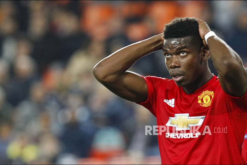 Ekspresi Paul Pogba saat gagal mencetak gol pada laga Grup H Liga Champions Eropa antara Valencia melawan Manchester United di Valencia Stadium, Valencia, Spanyol, Rabu (13/12) dini hari.