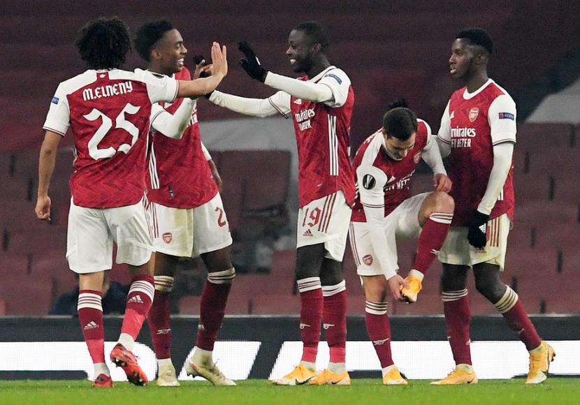 Ekspresi pemain Arsenal saat mengalahkan Molde di ajang Liga Europa.