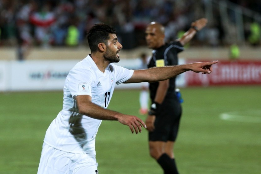 Ekspresi pemain Iran Mehdi Taremi seusai mencetak gol ke gawang Uzbekistan.
