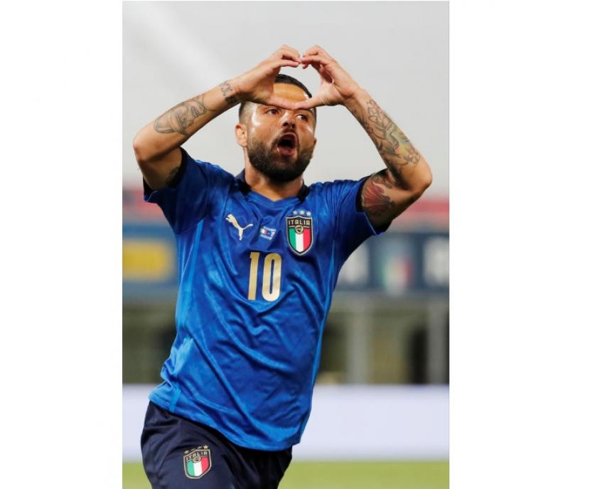 Ekspresi penyerang Italia, Lorenzo Insigne usai mencetak gol ke gawang Republik Ceko pada laga persahabatan di DallÁrra, Sabtu (5/6) dini hari WIB.