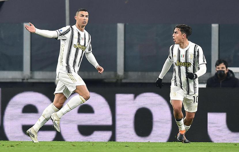 Ekspresi penyerang Juventus Cristiano Ronaldo (kiri) seusai menjebol gawang Udinese.