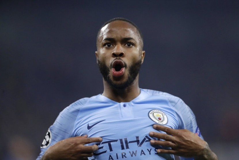 Ekspresi penyerang Manchester City Raheem Sterling setelah menjebol gawang Schalke.