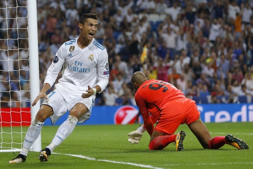 Ekspresi penyerang Real Madrid Cristiano Ronaldo seusai menjebol gawang APOEL pada pertandingan Grup H Liga Champions di Santiago Bernabeu, Kamis (14/9) dini hari WIB.
