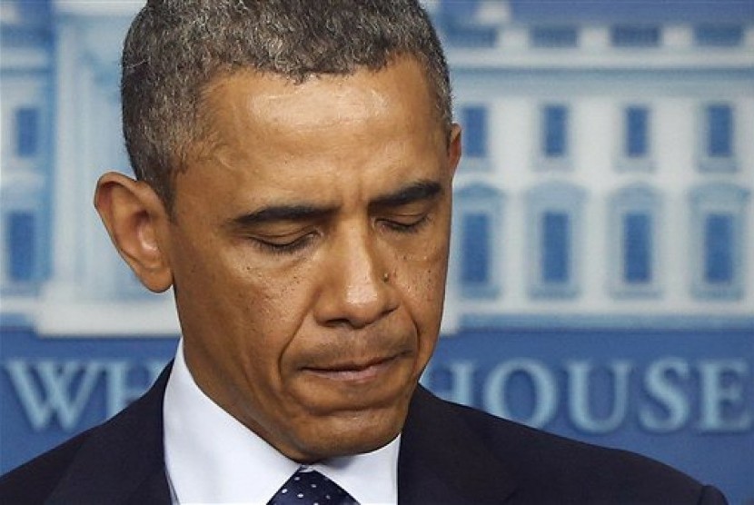 Ekspresi Presiden AS, Barack Obama, saat menyampaikan pernyataan singkat usai ledakan bom di Boston, Selasa (16/4) pagi WIB.