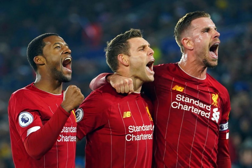 Ekspresi tiga pemain Liverpool usai meraih kemenangan.