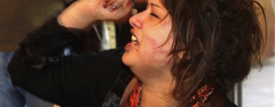 Eman Al-Obeidi berteriak mengaku diperkosa dan disiksa tentara Libya di sebuah hotel di Tripoli.
