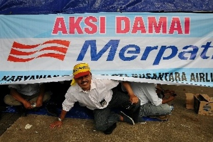 Employees of Merpati Nusantara Airlines staged a rally