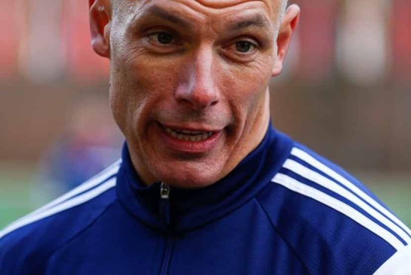 England's referee Webb addresses the media during a training camp for referees for the 2014 FIFA World Cup Brazil in Zurich