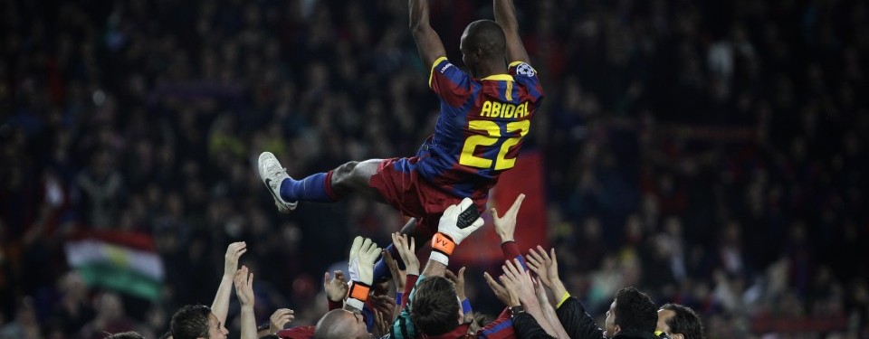 Eric Abidal, yang kembali tampil usai operasi hati, menjadi bintang Barcelona.