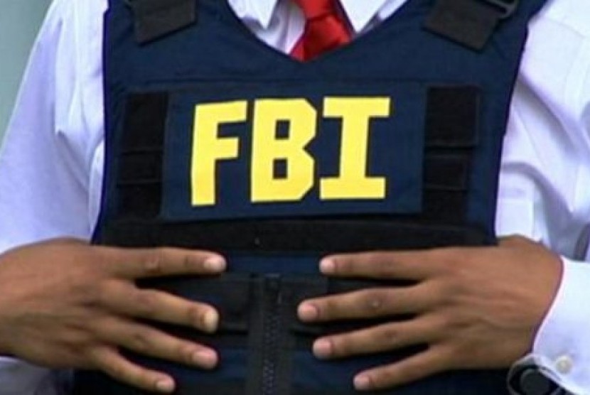 Petugas Federal Bureau of Investigation (FBI). FBI Ungkap Rencana ISIS Membunuh Mantan Presiden AS George W. Bush
