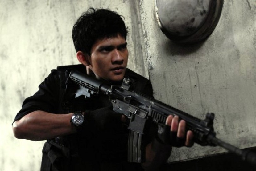 Aktor asal Indonesia, Iko Uwais, saat berakting di film The Raid.