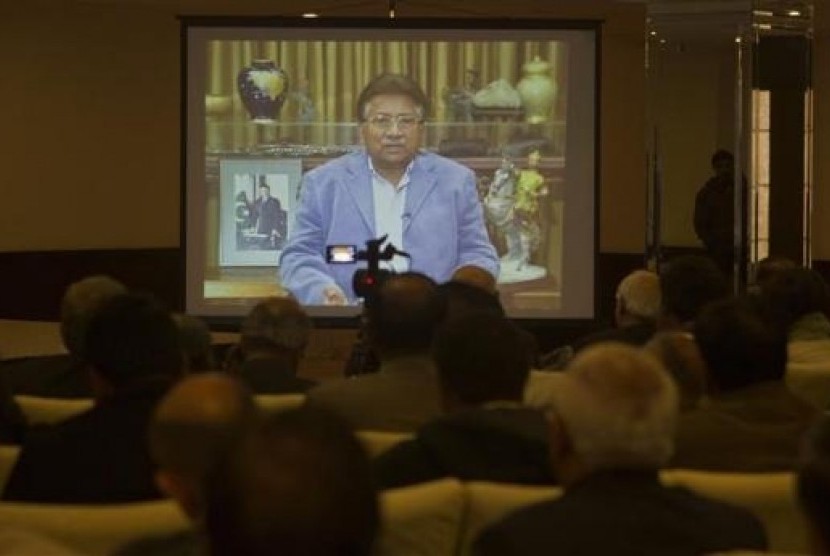 Former Pakistani president Pervez Musharraf is seen during a pre-recorded video statement played for his supporters and members of the media in Islamabad December 31, 2013.