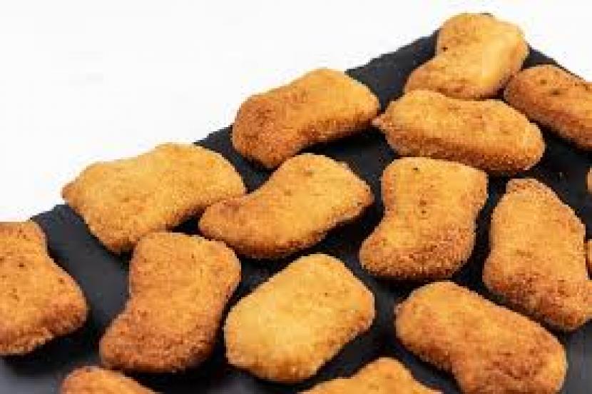 Raksasa restoran cepat saji, Kentucky Fried Chicken (KFC), mencoba untuk menciptakan chicken nugget pertama di dunia yang diproduksi di laboratorium 3D (Foto: ilustrasi chicken nugget)