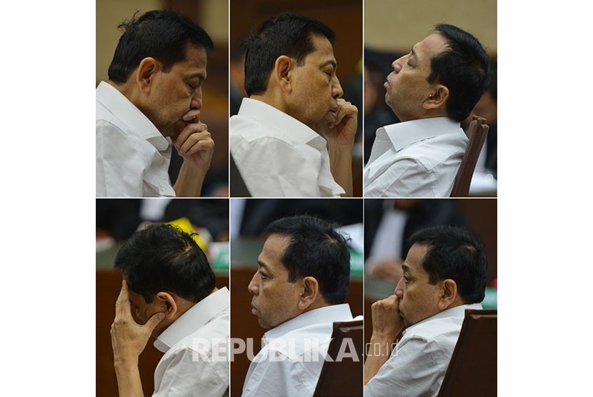 Defendant Setya Novanto's expression during inaugural session of e-ID card graft case at Corruption Court, Jakarta, on Wednesday (December 13).