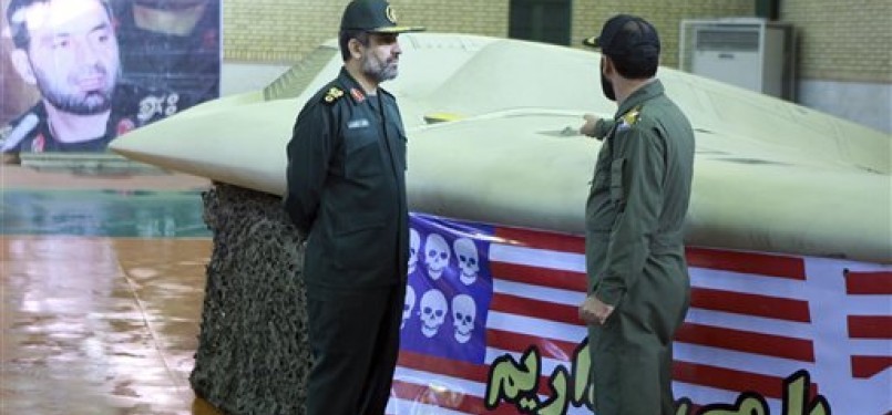 Foto yang dirilis Garda Revolusi Iran menunjukkan pesawat mata-mata AS RQ-170 Sentinel yang diklaim ditembak jatuh tentara Iran.