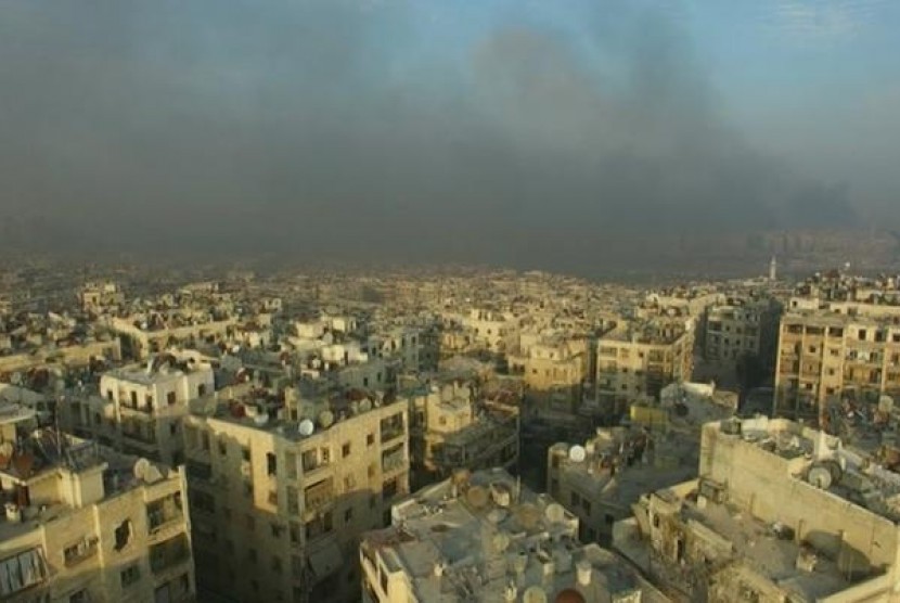 Picture from video of December 12 showing smoke from bomb explotion in east of Aleppo, Syria.