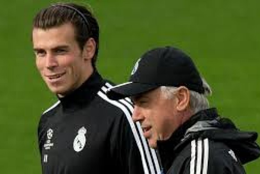 Gareth Bale bersama Carlo Ancelotti saat masih di Real Madrid.