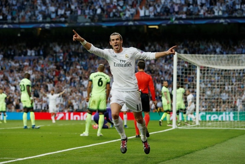 Gareth Bale merayakan gol kemenangan Real Madrid atas Manchester City.