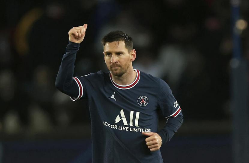 Gaya Lionel Messi setelah mencetak gol untuk Paris Saint Germain (PSG) ke gawang Club Brugge di Liga Champions, Rabu (8/12) WIB.