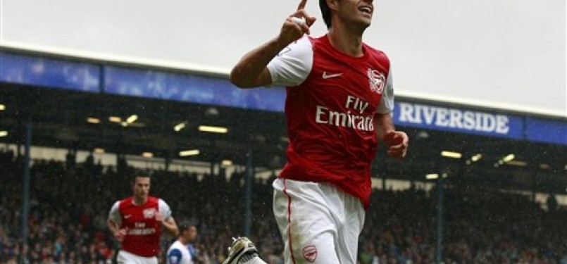 Gelandang Arsenal, Mikel Arteta, saat merayakan golnya kala membela The Gunners.