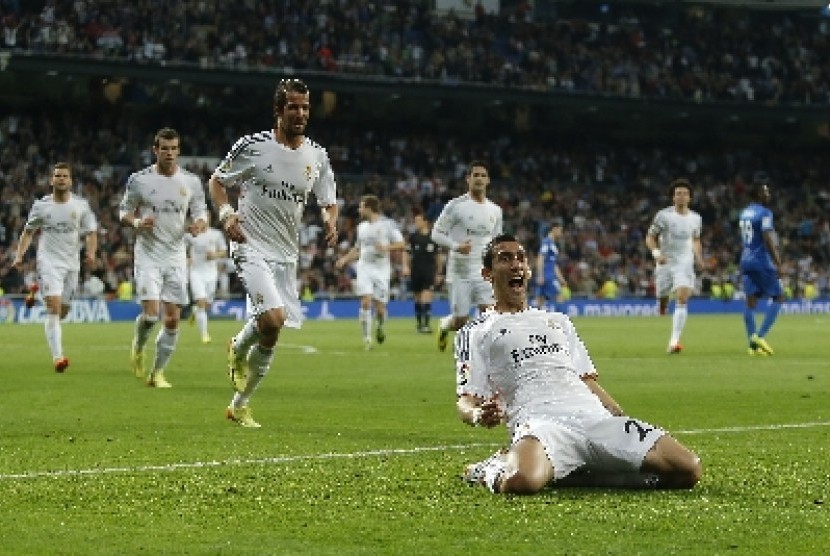 Gelandang Real Madrid, Angle Di Maria melakukan selebrasi usai mencetak gol.