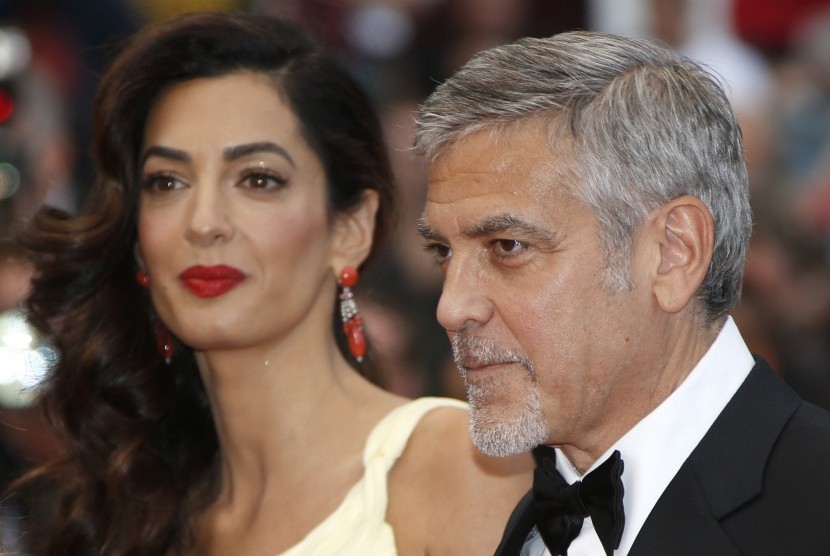George Clooney dan istrinya, Amal Alamuddin.