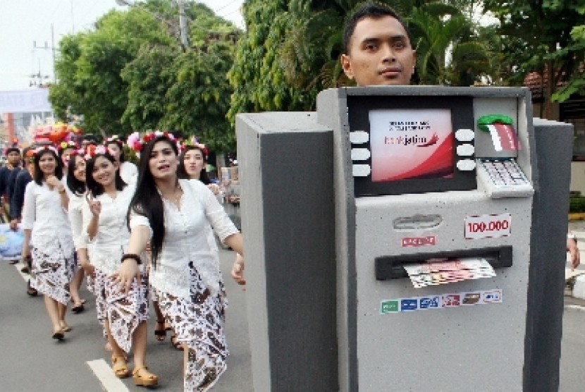 Gerakan penggunaan uang elektronik.