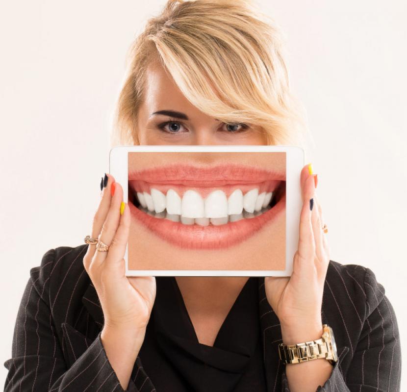 Penyebab gigi berubah warna menurut dokter. (ilustrasi).