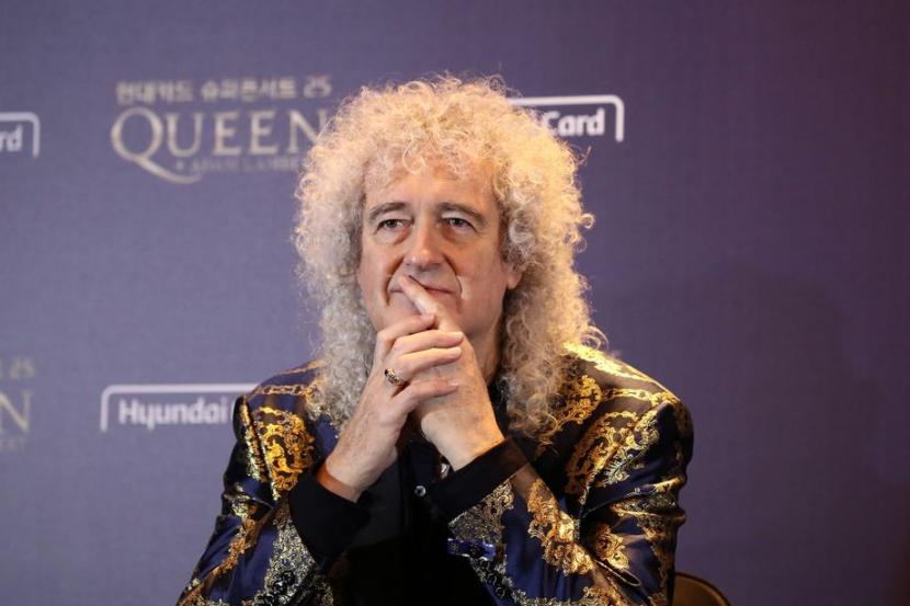 Gitaris Queen, Brian May, sering berbeda pandangan dengan sesama gitaris kawakan, Eric Clapton.