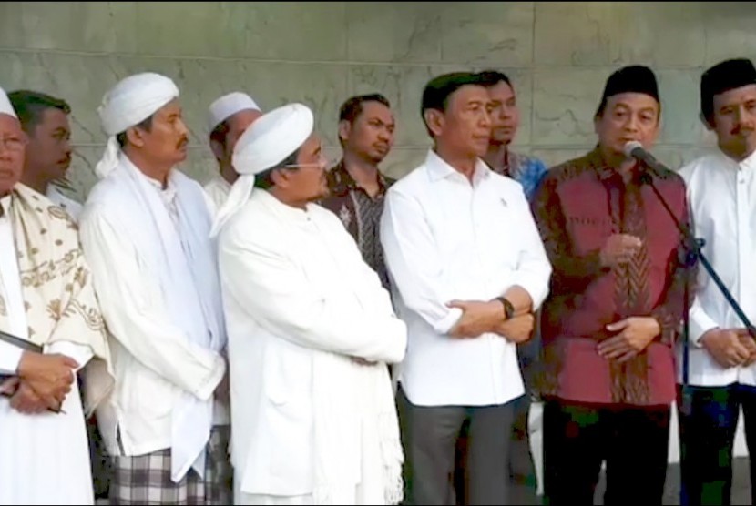 GNPF leaders gave a statement to the press after meeting with Coordinating Minister of Politics, Law, and Security Affairs Wiranto at the minister house on Thursday. 