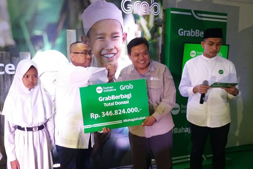 Grab dan PKPU Human Initiative bekerja sama dalam program GrabBerbagi untuk mendekatkan anak-anak yatim dengan kebahagiaan Hari Raya.