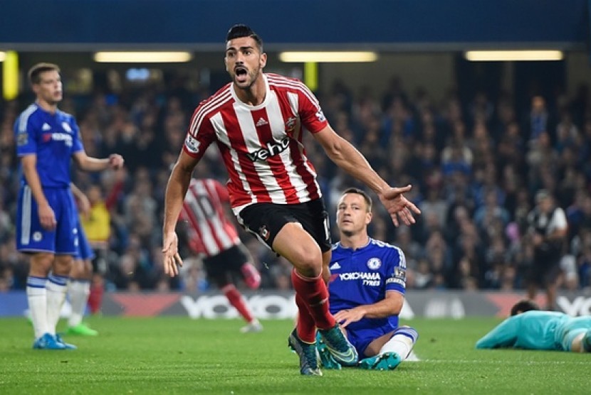 Graziano Pelle celebrates after scoring the third.