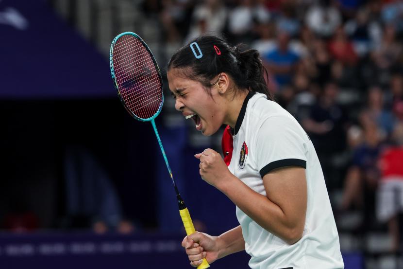 Gregoria Mariska Tunjung dipastikan meraih medali perunggu setelah Carolina Marin mengundurkan diri karena mengalami cedera.