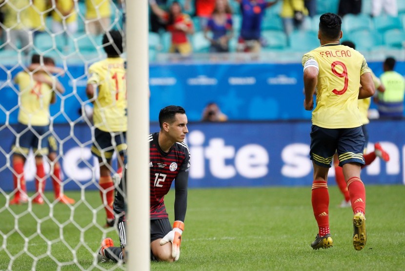 Gustavo Cuellar merayakan gol ke gawang Paraguay.
