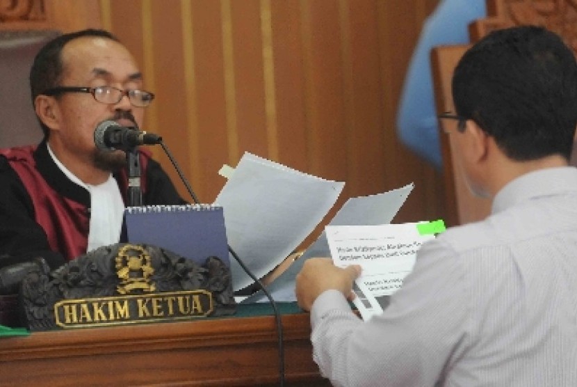 Hakim Sarpin Rizaldi memutuskan Komjen Budi Gunawan tak bersalah di PN Jaksel, Senin (16/2).
