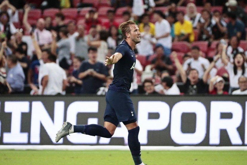 Harry Kane merayakan gol ke gawang Juventus.