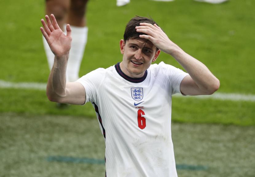 Harry Maguire dari Inggris merayakan setelah pertandingan sepak bola babak 16 besar UEFA EURO 2020 antara Inggris dan Jerman di London, Inggris, 29 Juni 2021. 