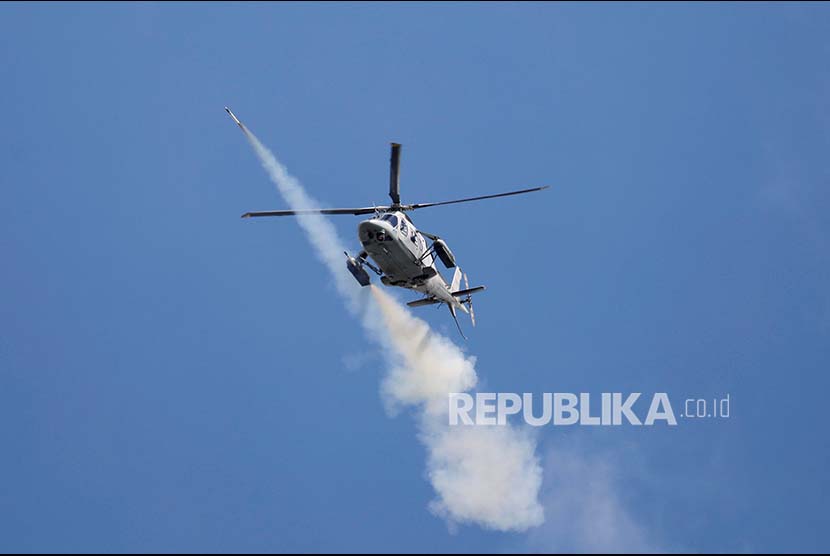 Helikopter pemerintah menembakkan roket ke arah kelompok bersenjata Maute di Marawi City, Filipina Selatan.