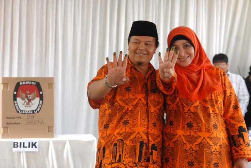 Hidayat dan isteri mencoblos di TPS 013