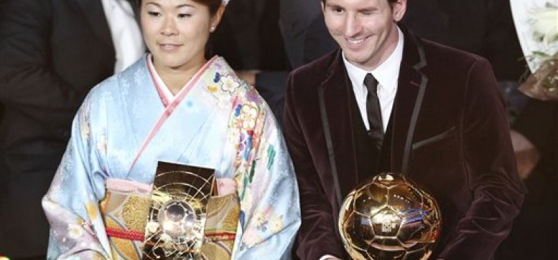 Homare Sawa dan Lionel Messi.