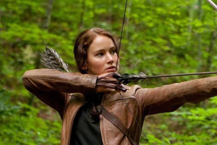 Jennifer Lawrence saat berakting di film Hunger Games. Lionsgate secara resmi mengundang penonton kembali menikmati kisah Hunger Games melalui prekuel berjudul The Ballad of Songbirds and Snakes.