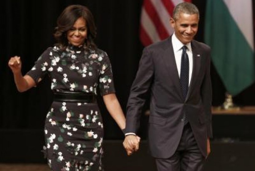 Ibu Negara AS, Michelle Obama, bersama Presiden AS, Barrack Obama.