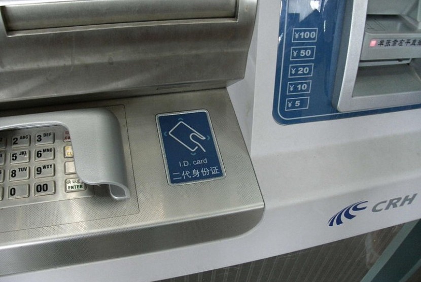 ID card in China is used for many purposes. Prior to purchasing tickets at a railway station, for example, individuals must verify their identity by swiping their resident identity card over an identity card reader. (File photo)