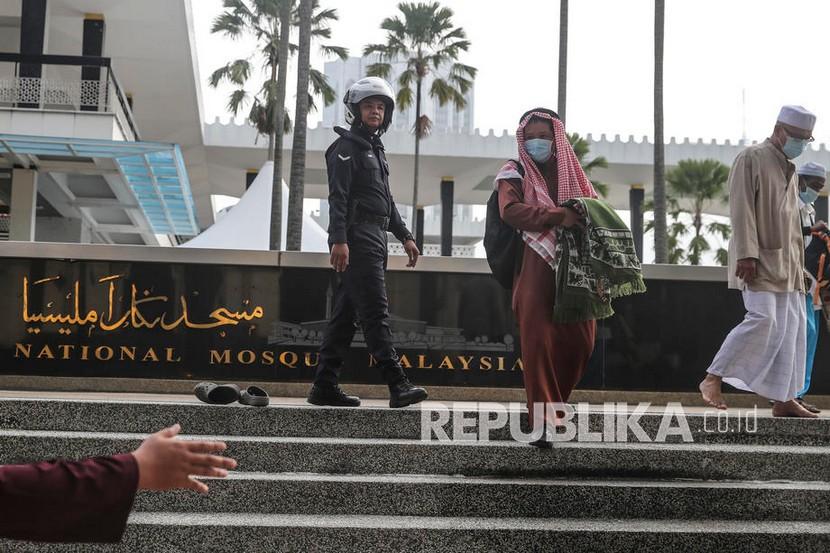 Ilustrasi Muslim Malaysia. Majelis Ulama Malaysia Larang Artis Kesampingkan Syariat demi Akting