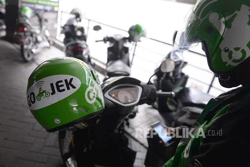 Ilustrasi pengendara Go Jek.